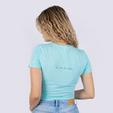 Women's Fitted Eco-Friendly T-Shirt Band-Aid Aqua Organic Cotton El arte de cuidar" ("The Art of Caring")