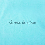 Women's Fitted Eco-Friendly T-Shirt Band-Aid Aqua Organic Cotton El arte de cuidar" ("The Art of Caring")